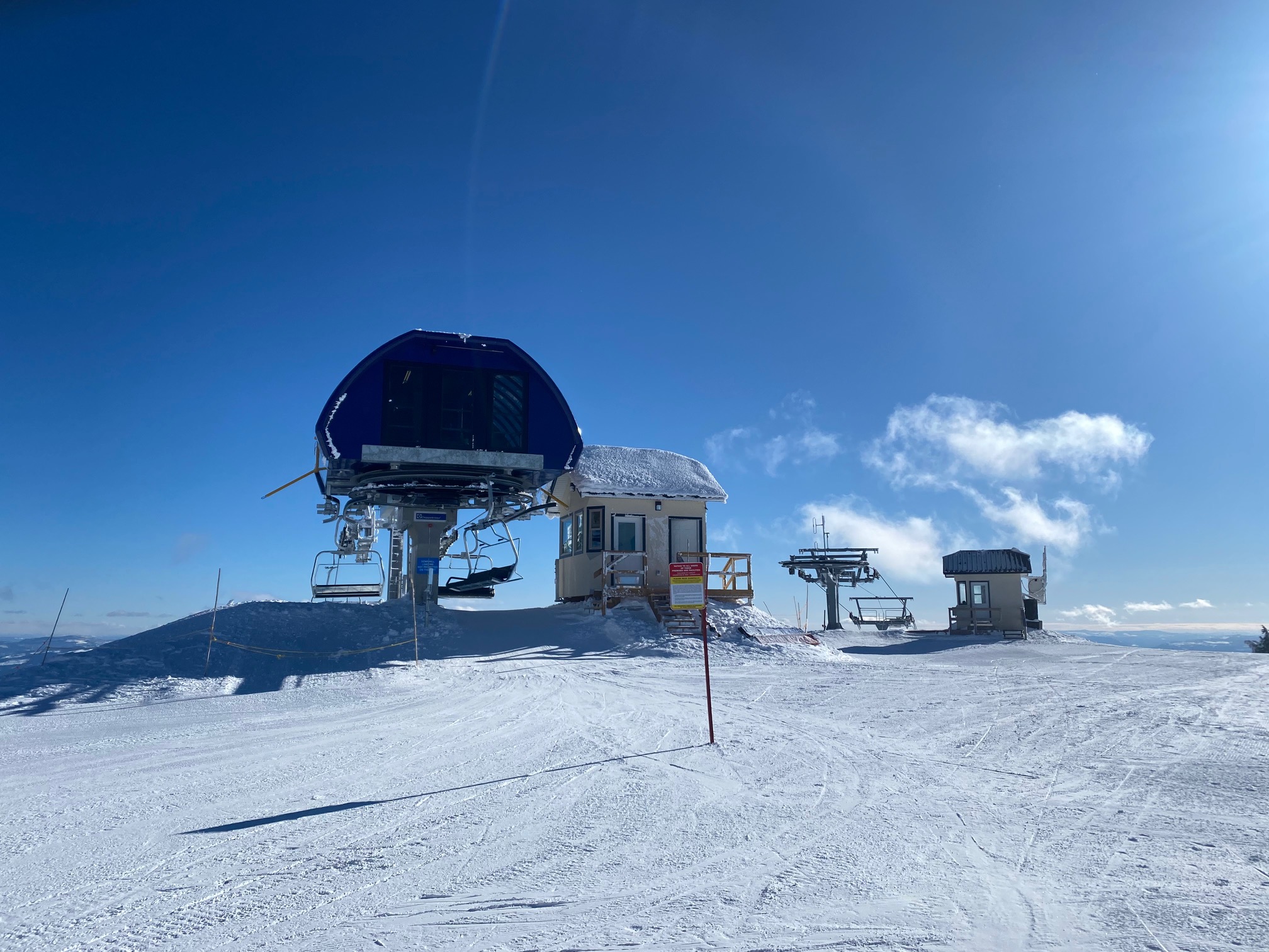 Crystal and Burfield chairs meeting at the Top of the World Sun Peaks