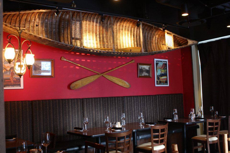 canoe on wall of Voyageur Bistro in Sun Peaks