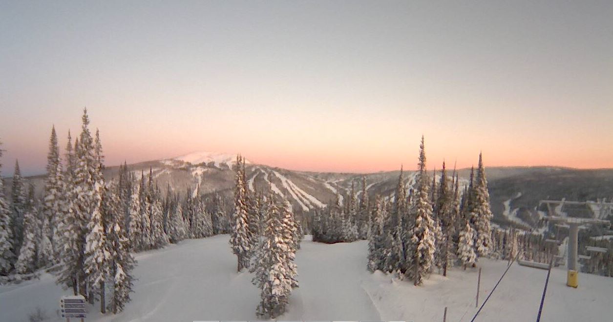 View from top of Mt. Morrisey at Sun Peaks Resort with alpenglow